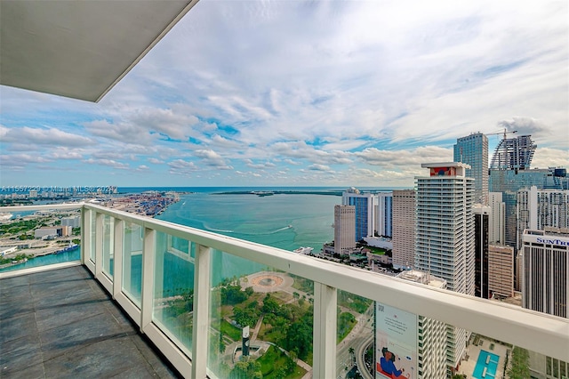 balcony featuring a water view