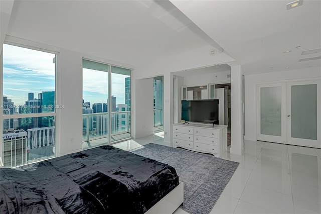 bedroom featuring light tile floors