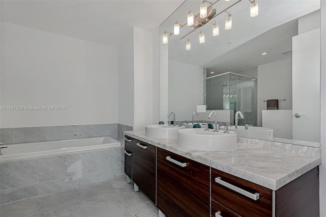 bathroom with plus walk in shower, vanity, and tile flooring