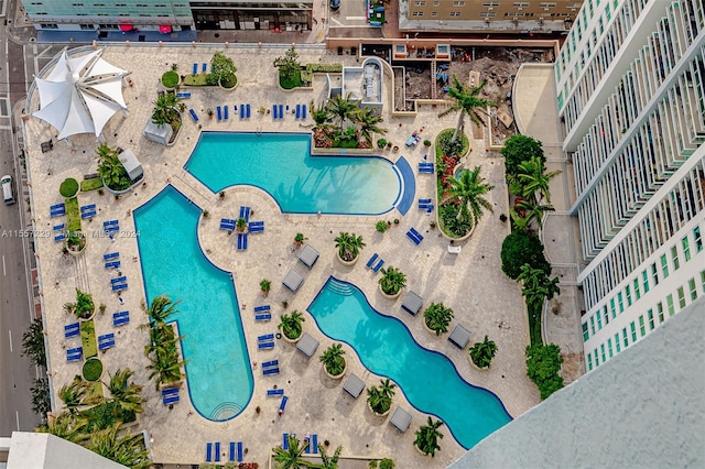 view of swimming pool with a patio area