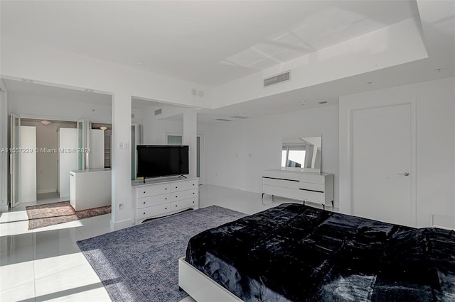 bedroom featuring tile floors