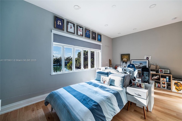 bedroom featuring hardwood / wood-style flooring