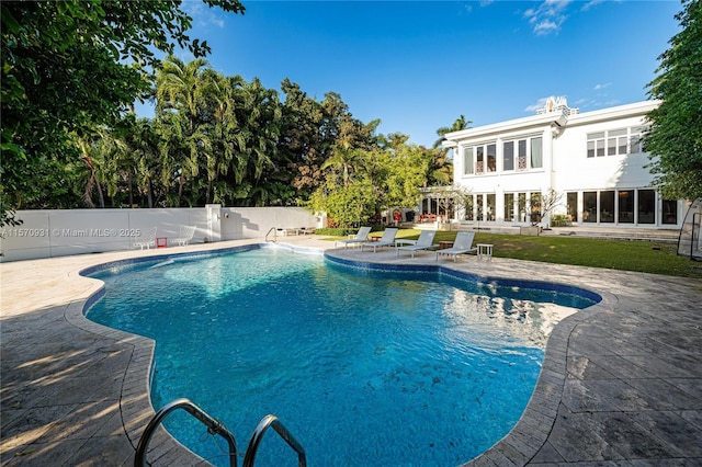 view of pool featuring a patio