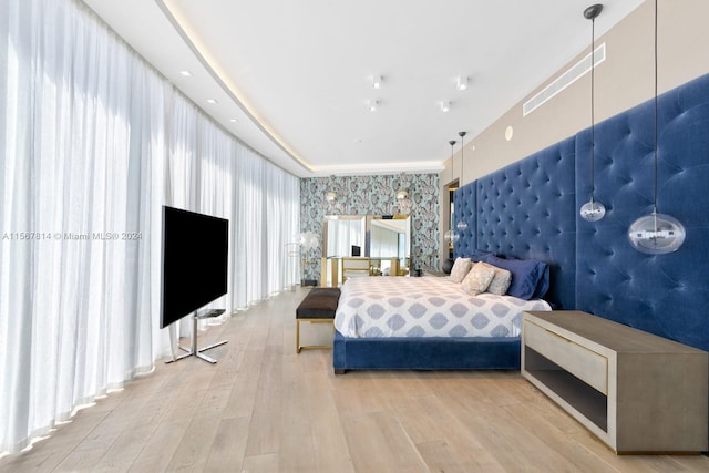 bedroom featuring light hardwood / wood-style flooring