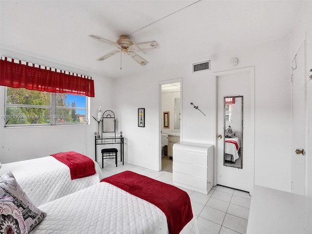 bedroom featuring ceiling fan, connected bathroom, and light tile floors