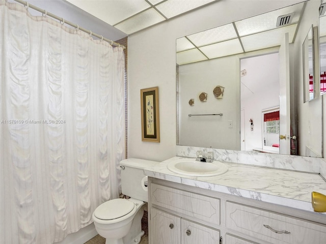 bathroom featuring toilet and oversized vanity