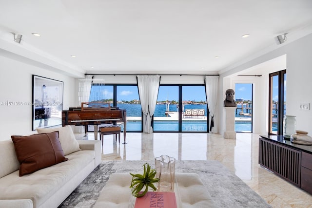 living room featuring a water view