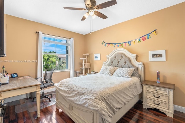 bedroom featuring dark wood-type flooring and ceiling fan