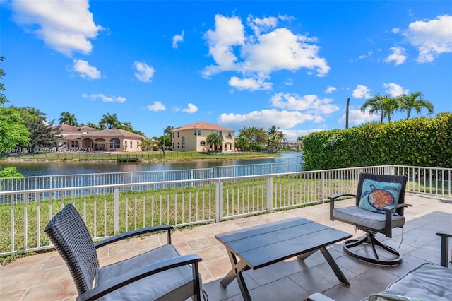 view of patio / terrace with a water view