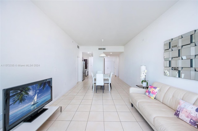 living room featuring light tile flooring