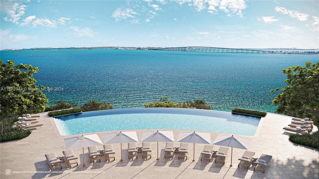 view of swimming pool featuring a patio