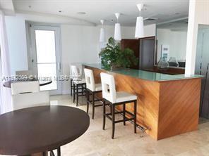 kitchen with a kitchen breakfast bar