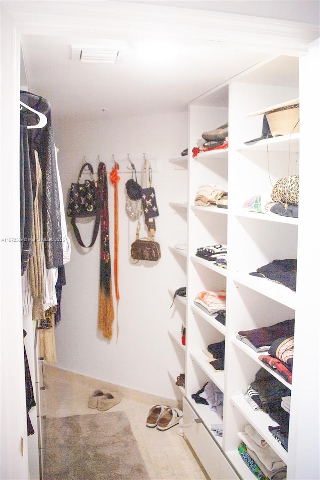 walk in closet featuring visible vents