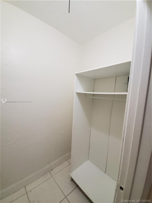 mudroom with light tile floors