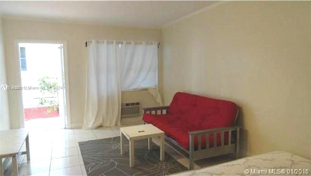 living area featuring tile floors