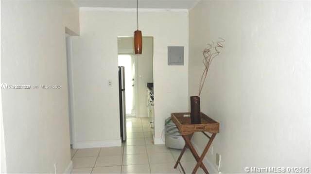 hallway featuring tile floors