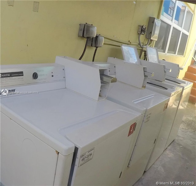 clothes washing area featuring washer / clothes dryer