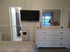 unfurnished bedroom with ensuite bath