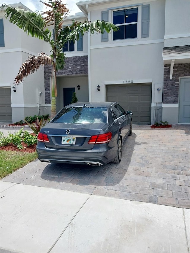 view of front of house with a garage