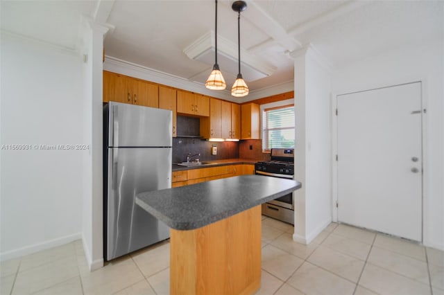 kitchen featuring appliances with stainless steel finishes, a center island, sink, backsplash, and pendant lighting