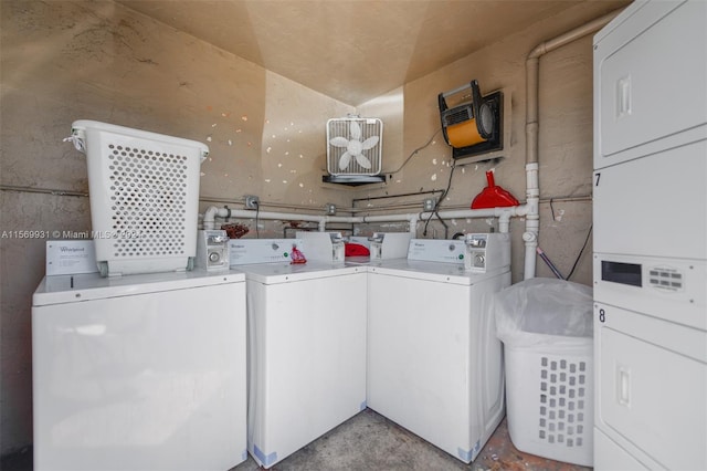 laundry area featuring washing machine and clothes dryer