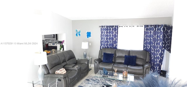 living room with light tile flooring