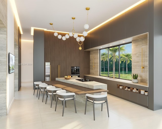 dining space featuring a chandelier and light tile patterned floors