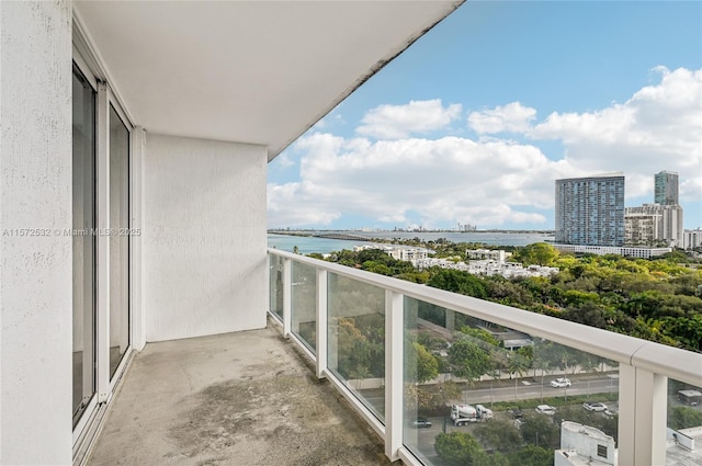 balcony featuring a water view