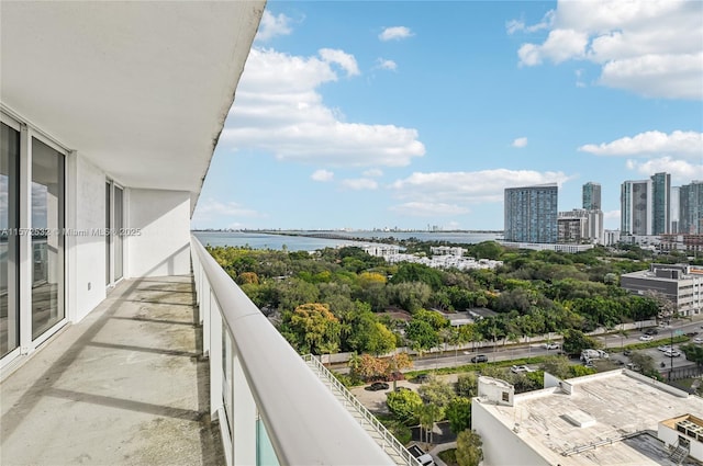 balcony featuring a water view