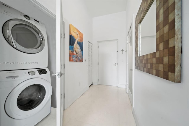 laundry room featuring stacked washer and dryer