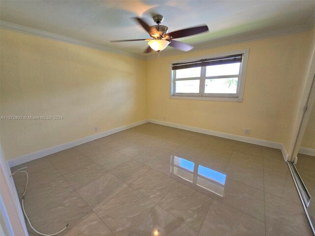 unfurnished room featuring ornamental molding and ceiling fan