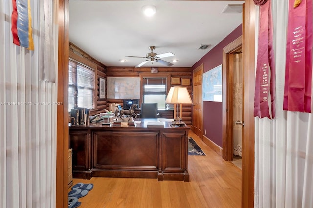 office space featuring light hardwood / wood-style floors and ceiling fan