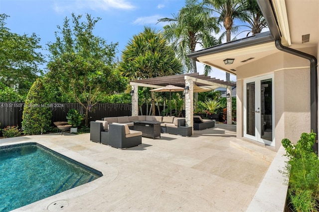 view of swimming pool with a patio area, an outdoor hangout area, and a pergola