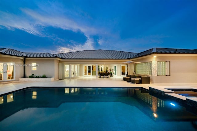 view of pool with a patio and an outdoor hangout area