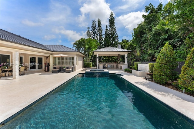 view of pool with a gazebo and a patio