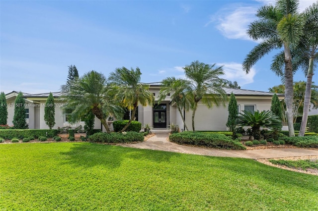 view of front of property with a front lawn