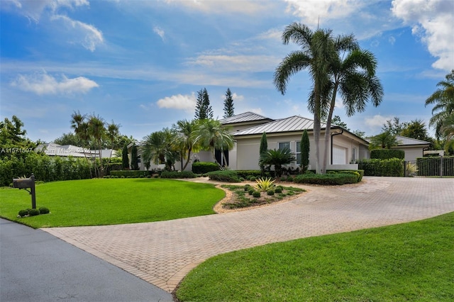 single story home with a front yard