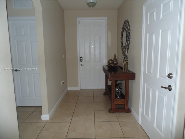 view of tiled entrance foyer