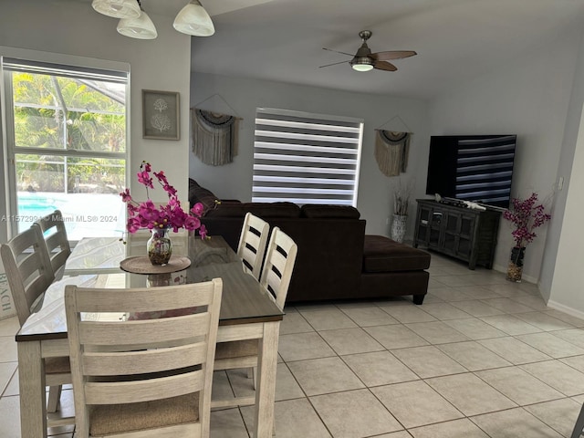 dining area featuring ceiling fan and light tile floors