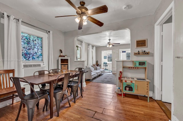 dining area featuring light hardwood / wood-style flooring and ceiling fan