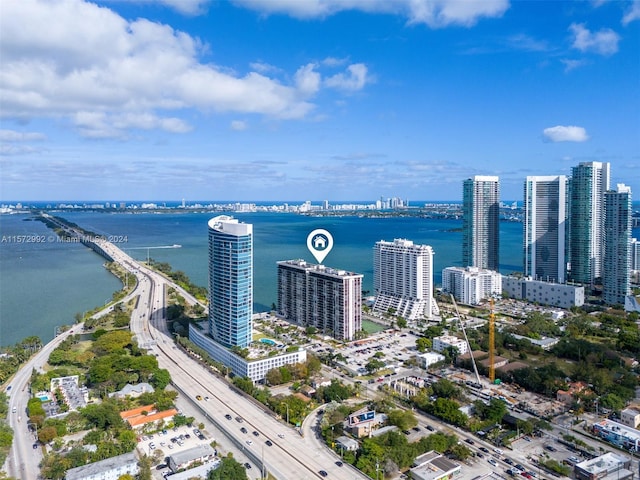 birds eye view of property featuring a water view