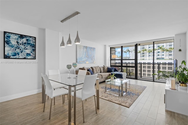 dining room featuring a wall of windows