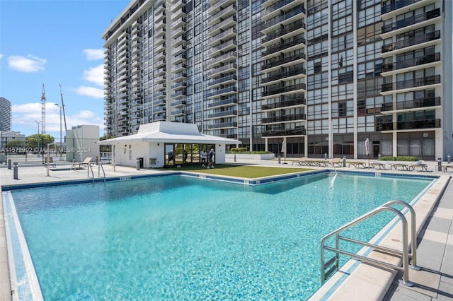 view of pool featuring a gazebo and a patio