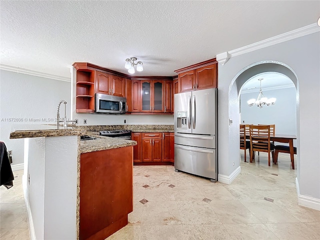 kitchen featuring sink, hanging light fixtures, a textured ceiling, appliances with stainless steel finishes, and ornamental molding