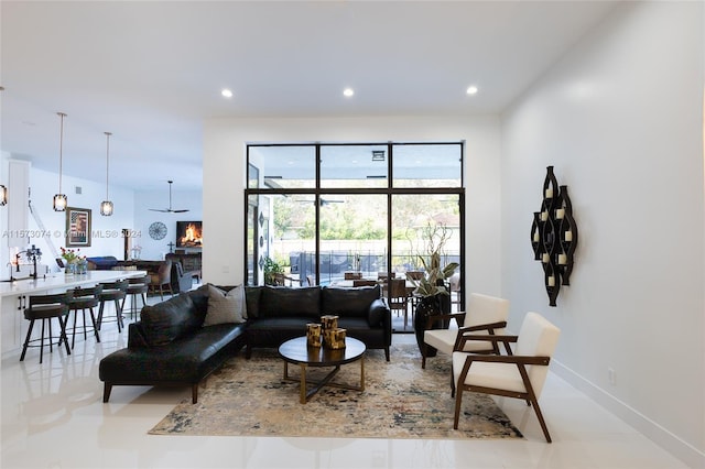 living room featuring light tile floors