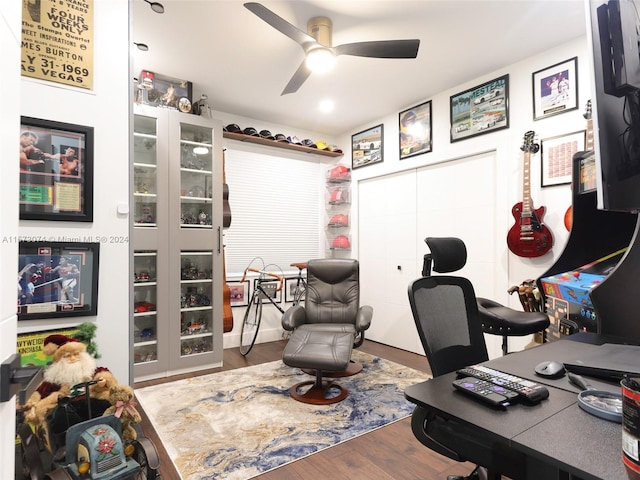 office space featuring ceiling fan and dark wood-type flooring