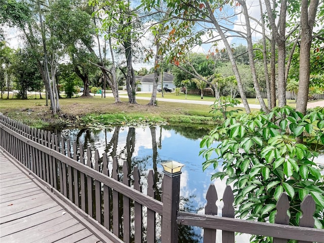 wooden terrace with a water view