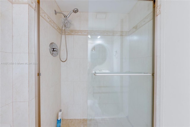 bathroom featuring an enclosed shower