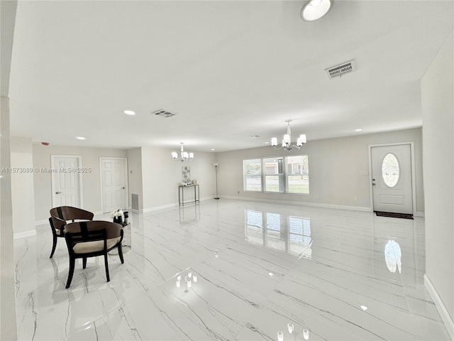 living room featuring a chandelier