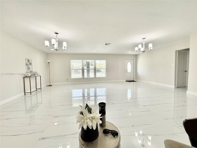 living room with a notable chandelier